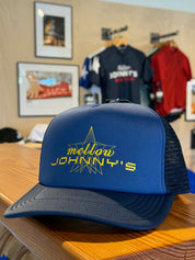 Blue hat with 'Mellow Johnny's' logo on a wooden surface.